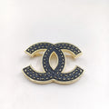 Chanel Black 18K Gold Brooch