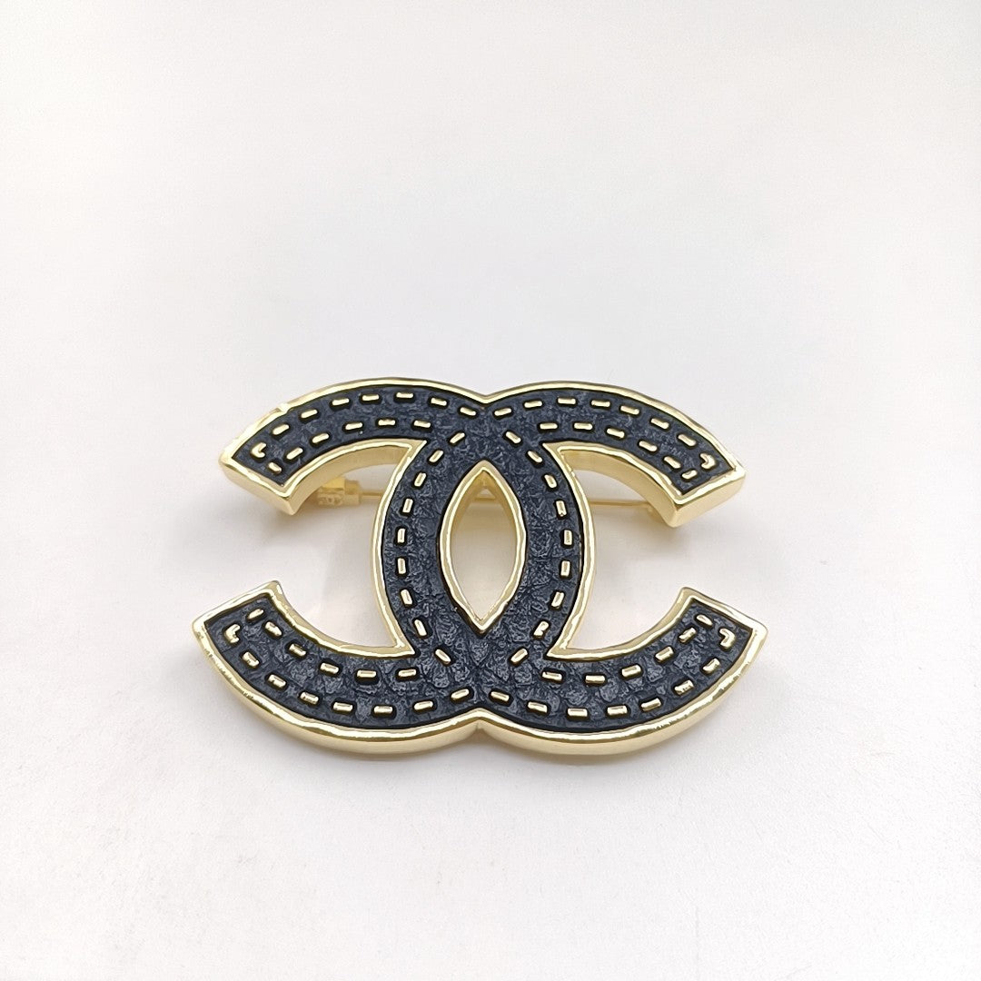 Chanel Black 18K Gold Brooch