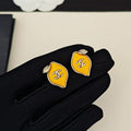 Chanel Yellow Leaf Gold 18K Gold Earrings