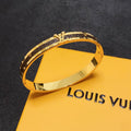 Louis Vuitton Leather Vintage 18K Gold Bracelet
