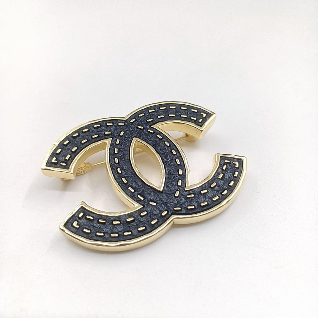 Chanel Black 18K Gold Brooch