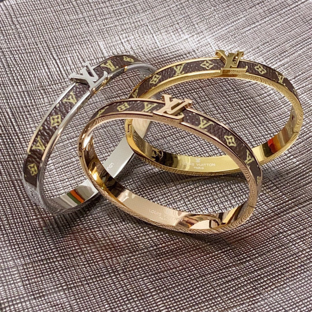 Louis Vuitton Leather Vintage 18K Gold Bracelet
